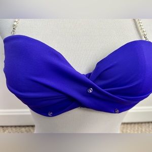 Victoria’s Secret 32a purple bandeau swimsuit top.